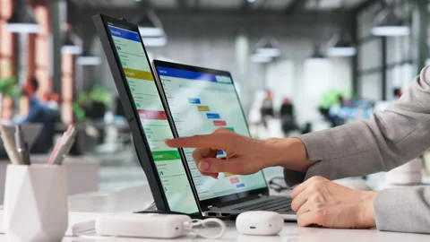 Manager Studies Schedule Carefully While Working Stock Footage 330587131
