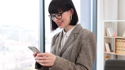 Manager in suit developing electronic communication using wireless connection. Video stock 265134737