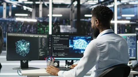 Manager supervising data center engineer using AI neural network models Stock Photos