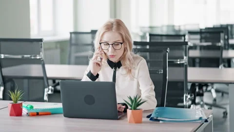 Manager talking by mobile with colleague Stock Footage 207485705