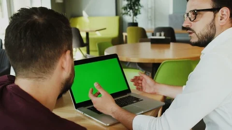 Manager talking with worker and having computer with chromakey screen Stock Footage 112992512