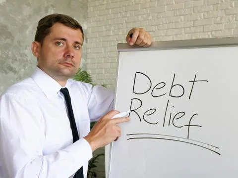 The manager talks about debt relief in a bank. Stock Photos