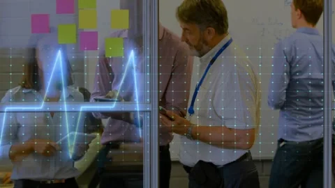 Manager tapping phone on alert, team pointing tablet by notes, waveform pulsing Stock Footage 333833030