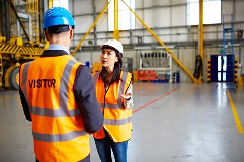 Manager, team and conversation in warehouse with logistics, PPE and strateg.. Stock Photos