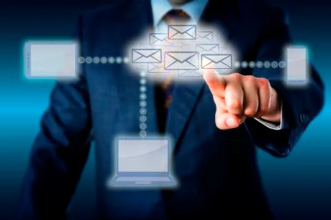 Manager Touching A Host Of Emails In Cloud Network Foto stock