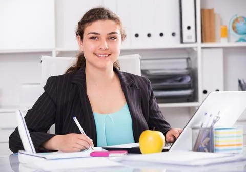 Manager trainee is having productive day at work Stock Photos