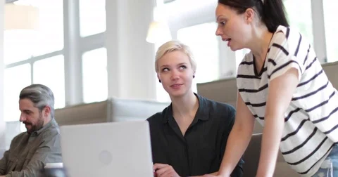 Manager training new employee in office Stock Footage 75892523