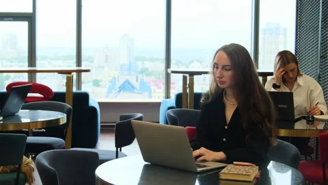 Manager types information for business project on laptop Stock Footage 275524626