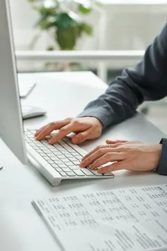 Manager typing document on computer Stock Photos