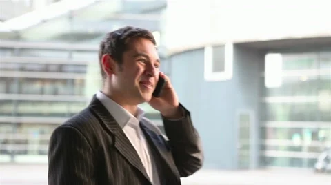 Manager using smartphone in city Stock Footage 11292187