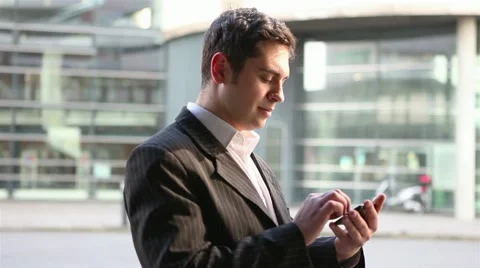 Manager using smartphone for orientation Stock Footage 11292229