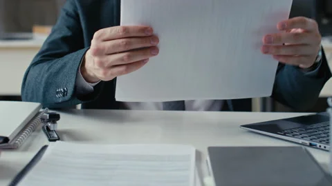 Manager Using Stapler to Staple Documents Video stock 255362089