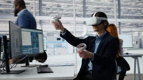 Manager using VR technology to optimize microchip production in factory Stock Footage 335881799