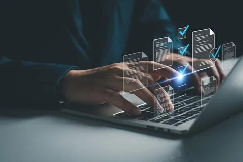 Manager is verifying the validity, security, approving requests, quality assu Stock Photos