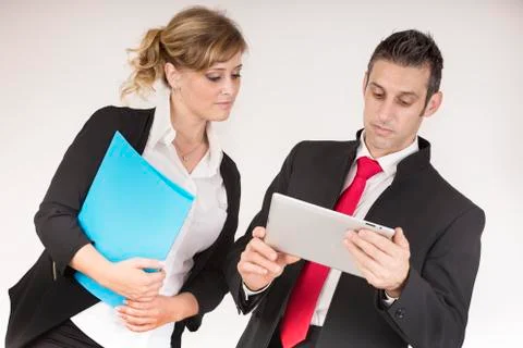 Manager work with the tablet with the secretary Stock Photos