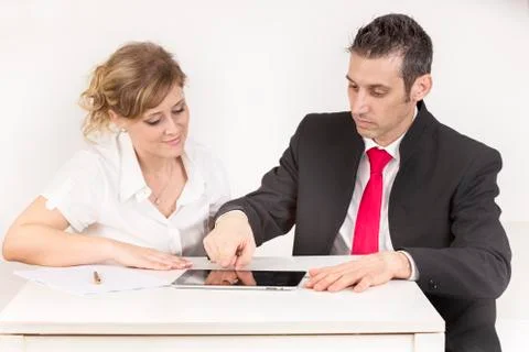Manager work with the tablet with the secretary Stock Photos