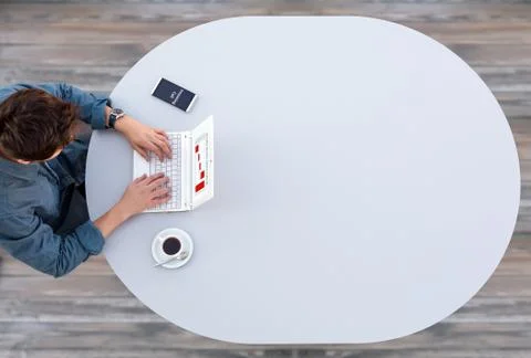 Manager Working on Computer at Grey Table Stock Photos