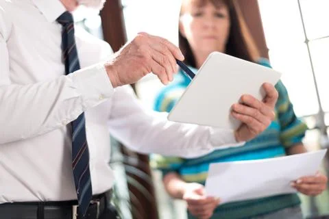 Manager working with executive assistant Stock-Fotos