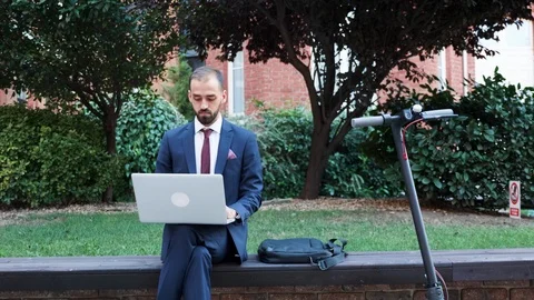 Manager working on the go on the laptop Stock Footage 114747937