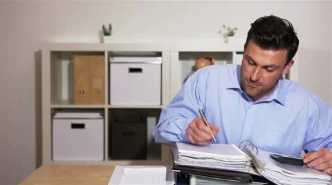 Manager working at his desk Stock Footage 11134928