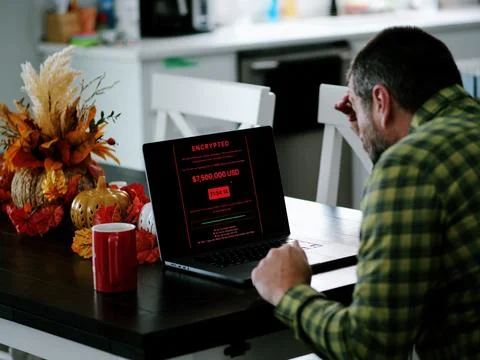 Manager Working Remotely Falls Victim to Malware Foto stock