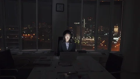 Manager works until late in the office. young female entrepreneur working on a Stock Footage 108589803