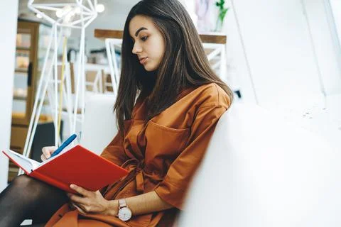 Manager writing on notebook preparing for meeting Stock Photos
