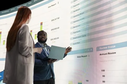 Managers analyze financial data report charts, brainstorm company business plan Stock Photos