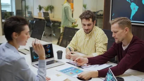 Managers analyzing data and planning strategy Stock Footage 132819347
