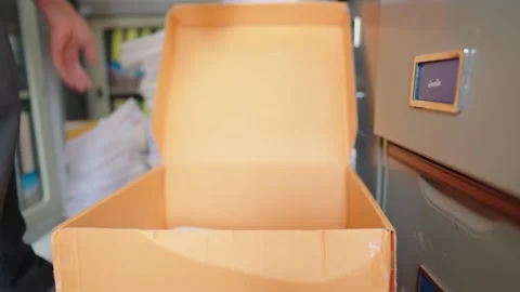 Managers are searching for and managing documents at the office. Stock Footage 148751933