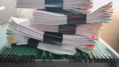 Managers are searching for and managing documents at the office. Stock Footage 148752203