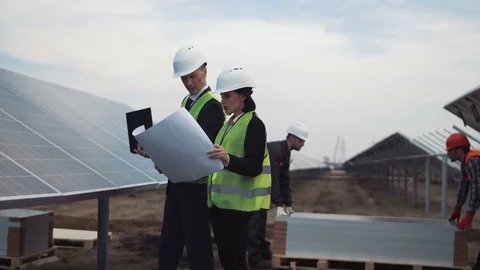 Managers discussing the solar energy plan Stock Footage