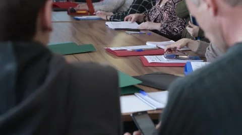 Managers get ready for meeting in Officeat the big Table Stock Footage 48806426