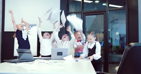 Managers joyfully toss up papers rejoicing at the finished work, slow motion Stock Footage 88934994