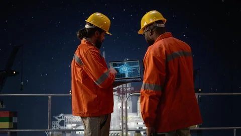 Managing disruption with AI, maritime blockade and drilling rig engineering team Stock Footage 336197824