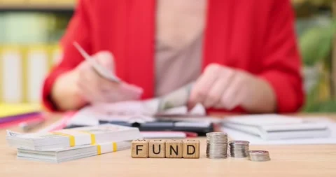 Managing funds effectively while budgeting and planning for a secure financial Stock Footage 319737828