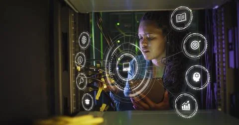 Managing network cables, technician examining connections in data center, with Stock Photos