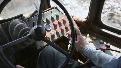Managing an old bulldozer. Close-up hand of man Stockbeeldmateriaal 76222845