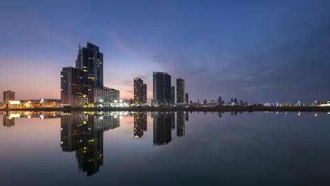 MANAMA, BAHRAIN - MARCH 10, 2021: 4K Day to night time lapse of Seef district Stock Footage