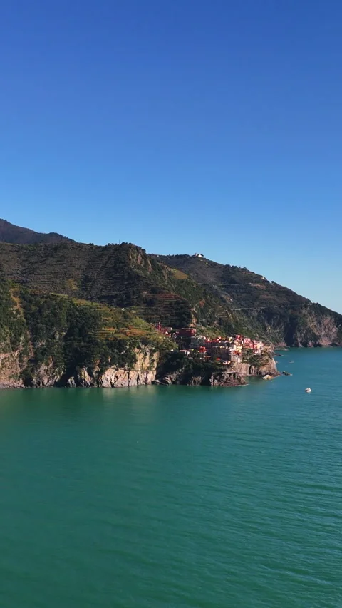 Manarola Cinque Terre drone pullback coastal village Italy turquoise sea Stock-Footage 335258573