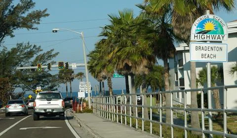 Manatee County, Florida, U.S - March 27, 2026 - Coastal roadway with palm t.. Stock Photos