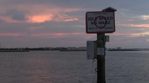 Manatee Zone/No Wake Sign - timelapse - Fort Pierce, Florida Stock Footage 80595505
