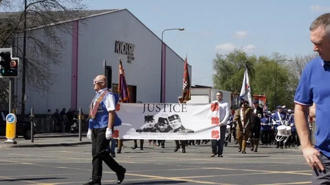 Manchester Apprentice Boys of Derry parade Justice for Three Scottish Soldiers Stock Footage 94512494