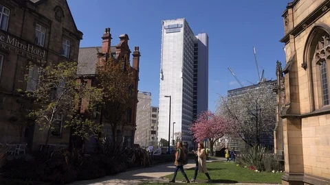 Manchester city centre architecture modern and old panning down UK England 4K Video stock 106979875