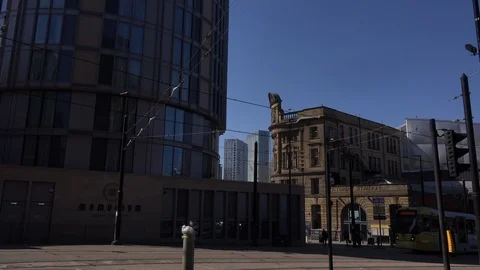 Manchester city centre architecture trams and people walking UK England 4K Stock Footage 106989014