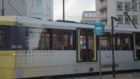 The Manchester tram passing through St Peter's Square in Manchester Stock-Footage 276176241