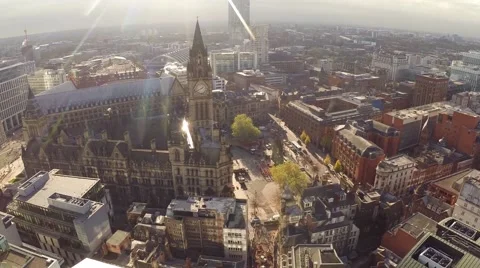 Manchester UK Aerial landscape, panning motion city center Stock Footage