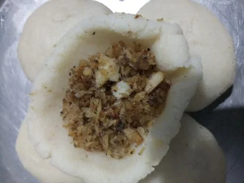 Manda pitha cake in india called steam rice cake Foto stock