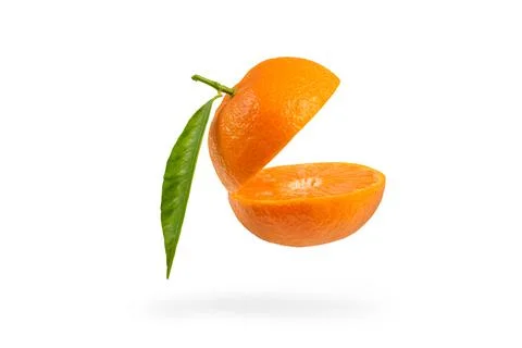 Mandarin cut in half with a green leaf. Fresh tangerine on a white isolated Stock Photos