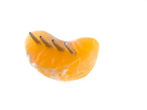 Mandarin on fork Fotos de archivo